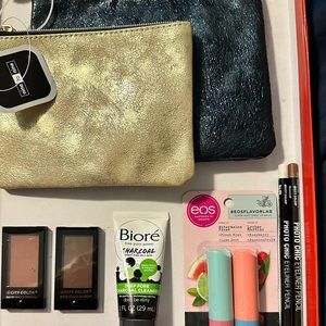 Filled Makeup Bags with Charcoal Masks, Lip Balms, Eye Shadow, and Eyeliners